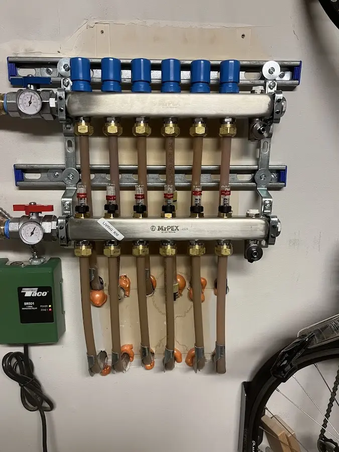 Plumber performing Gas Line Installation at a residential property in Danvers